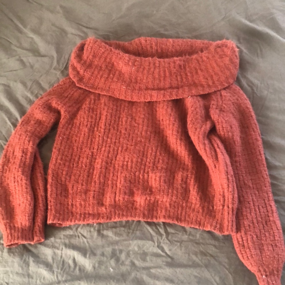 Burgundy sweater, cowl neck and can be worn off the shoulder size S